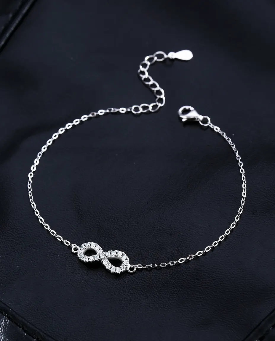 Infinity moissanite bracelet, D colour pave infinity symbol, 925 sterling silver