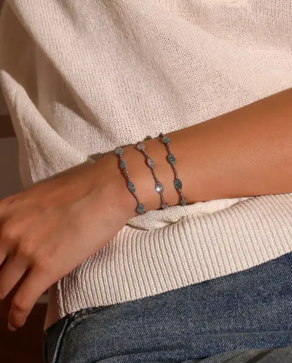 Caged Zircon Bracelet in 925 Sterling Silver - worn on the wrist, close-up