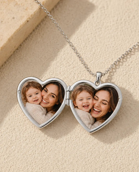 Heart photo locket necklace opened to show the two photos inside