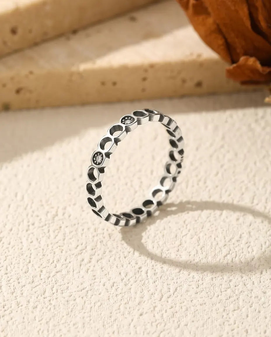 Moon phase eternity ring with moissanite in oxidised 925 silver