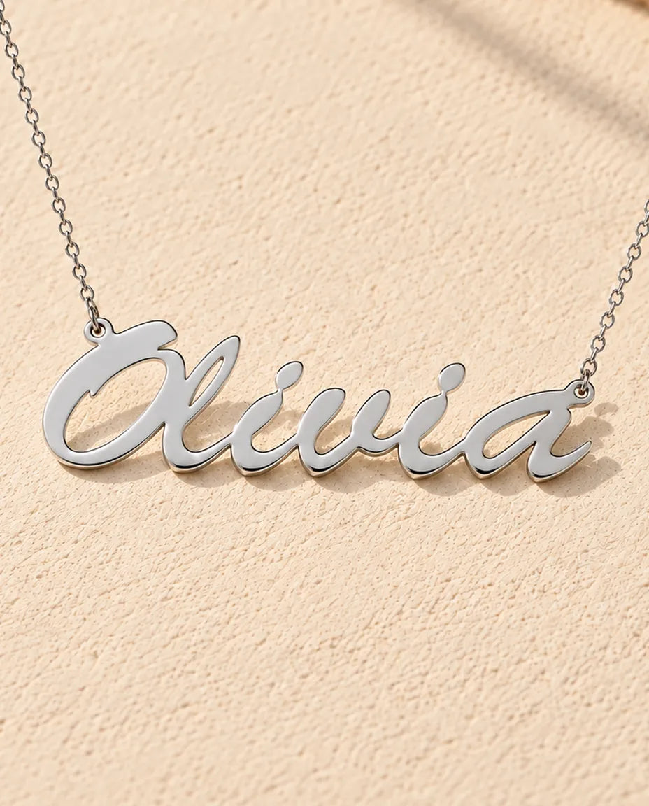 Personalised Brush Script Name Necklace in 925 Sterling Silver - Custom Nameplate - close-up of the cut-out name