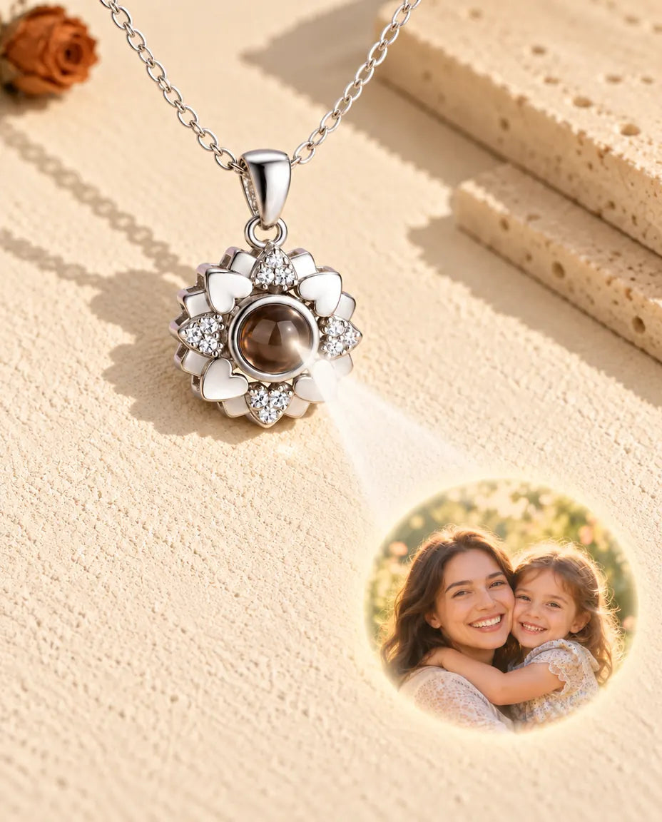 Silver tone heart flower necklace projecting a mother and daughter photo onto plaster