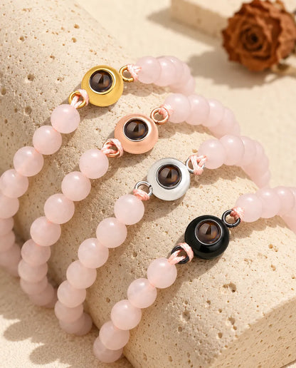 Rose pink bead projection bracelets in gold tone, rose gold tone, silver tone and black