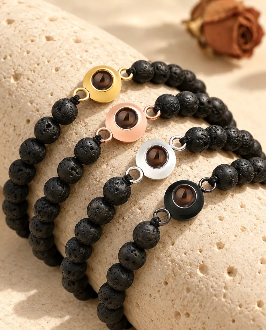 Black lava stone bead projection bracelets in gold tone, rose gold tone, silver tone and black