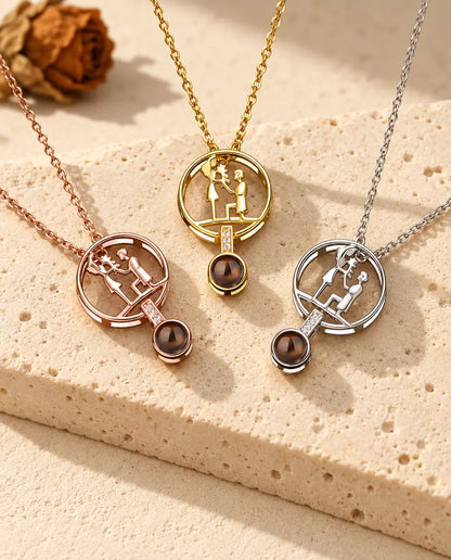 Proposal projection necklaces in silver tone, gold tone and rose gold tone side by side