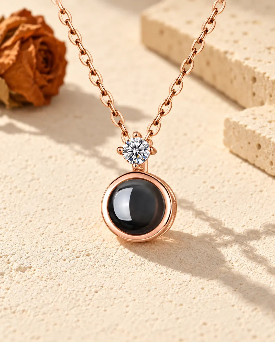 Personalised rose gold tone round photo projection necklace with a cubic zirconia solitaire