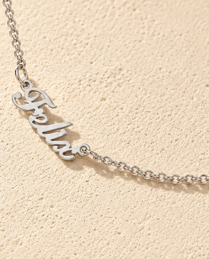 Personalised Two Name Necklace in 925 Sterling Silver - Two Script Nameplates Joined by Chain - close-up of the cut-out name