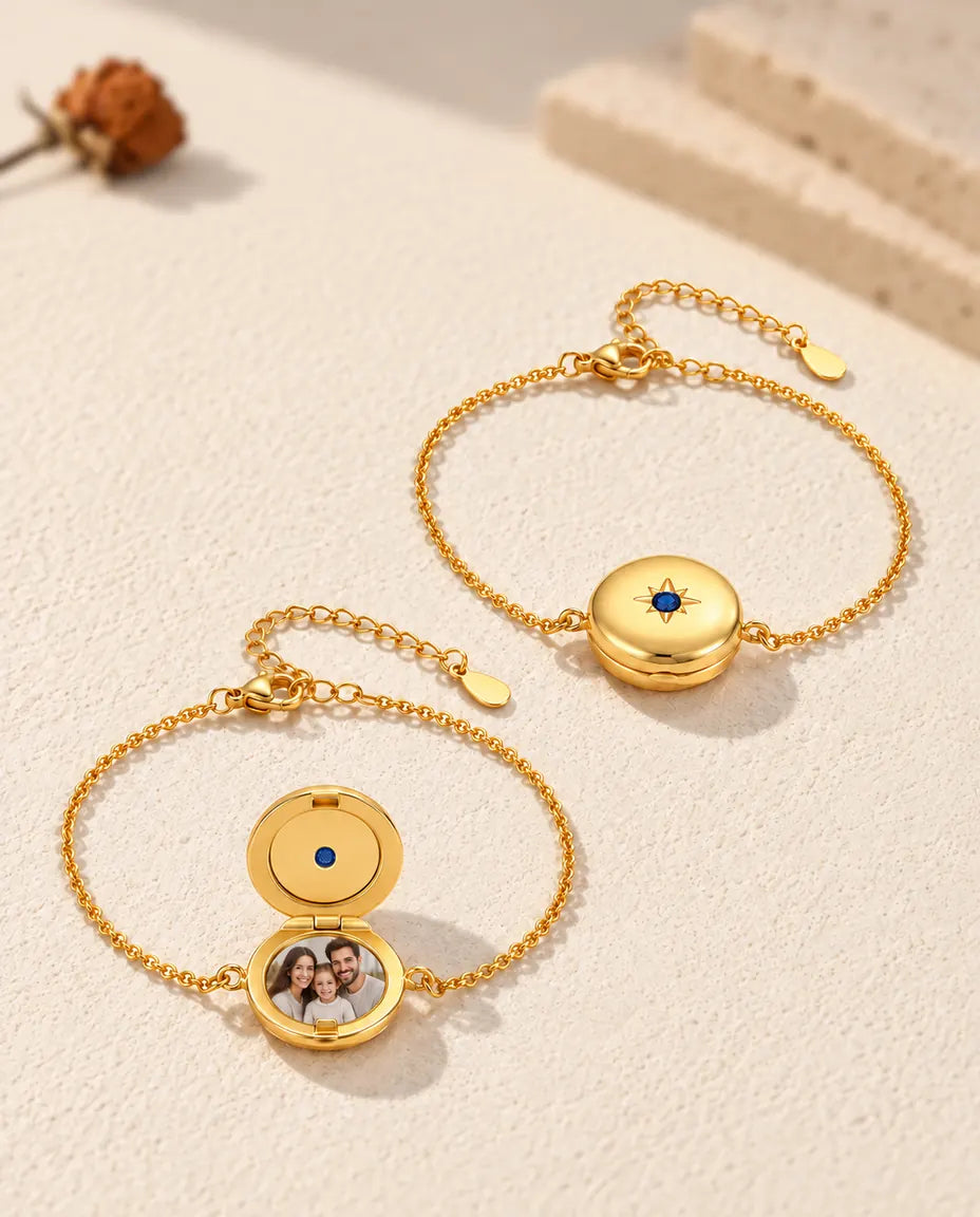 Two round locket bracelets, one closed and one open with a family photo