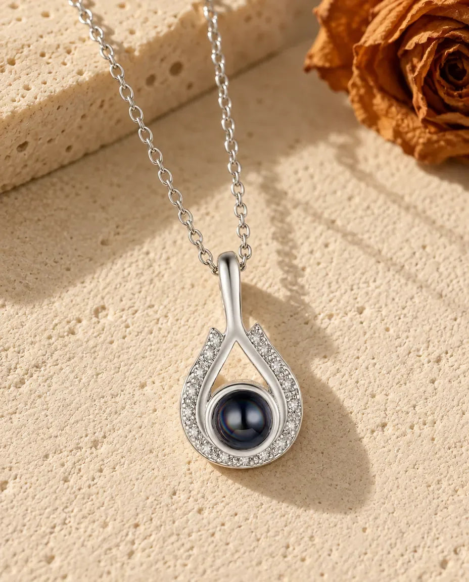 Personalised Teardrop Photo Projection Necklace in Silver - front view in silver